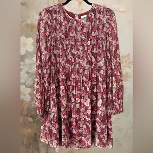 This is a Wilfred Daydreamer Floral Pleated Mini Dress.